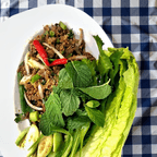 Best Larb Beef (Lao Style) 
Fresh cow meat sliced served cooked or no cook upon request, your choice off mild, medium or spicy.
Available occasionally. in Honolulu, HI